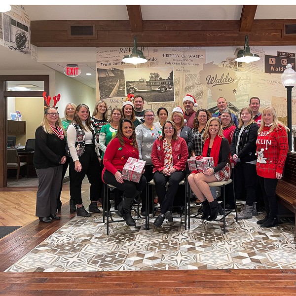 Waldo State Bank community bank employees posing for their Christmas photo 2022
